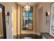 Modern hallway with large window featuring a city view at 3630 Peachtree Ne Rd # 3401, Atlanta, GA 30326