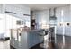 Open kitchen design with stainless appliances, marble backsplash, island with seating and overhead cabinets at 3630 Peachtree Ne Rd # 3401, Atlanta, GA 30326