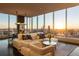 Bright living room with modern furnishings and floor-to-ceiling windows offering panoramic city views at 3630 Peachtree Ne Rd # 3401, Atlanta, GA 30326