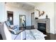 Cozy living room features fireplace, dark hardwood floors, and comfortable seating at 3630 Peachtree Ne Rd # 3401, Atlanta, GA 30326