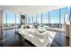Bright and airy living room boasts floor-to-ceiling windows with city views at 3630 Peachtree Ne Rd # 3401, Atlanta, GA 30326