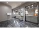 Spacious main bathroom featuring grey cabinetry, stylish lighting, and attractive marble floors at 3630 Peachtree Ne Rd # 3401, Atlanta, GA 30326