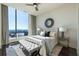 Sun-drenched bedroom with floor-to-ceiling windows and modern decor at 3630 Peachtree Ne Rd # 3401, Atlanta, GA 30326