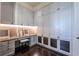 Office with upper and lower storage, counter space, and stool at 3630 Peachtree Ne Rd # 3401, Atlanta, GA 30326