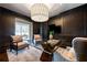 Office space features dark wood accents and glass table at 3630 Peachtree Ne Rd # 3401, Atlanta, GA 30326