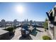 Enjoy city views from this rooftop terrace, complete with stylish outdoor seating and a cozy fireplace at 3630 Peachtree Ne Rd # 3401, Atlanta, GA 30326