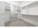 Spacious walk-in closet with custom shelving and mirrored doors at 3630 Peachtree Ne Rd # 3401, Atlanta, GA 30326