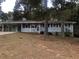 Charming single-story home with a covered carport, American flag, and well-maintained yard at 5250 Hollyhock Rd, Douglasville, GA 30135