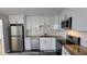 Beautiful kitchen with stainless steel appliances, granite counters, and white subway tile backsplash at 3515 Weathered Wood Dr, Ellenwood, GA 30294