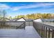 Back deck overlooking the tree line and the neighbors roof top at 5806 Highgrove Dr, Atlanta, GA 30349