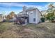 Spacious backyard featuring a wooden deck, stairs, and a fenced-in yard, ideal for outdoor activities at 5806 Highgrove Dr, Atlanta, GA 30349