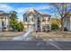 Charming two-story home with gray siding, stone accents, and a well-maintained front yard at 5806 Highgrove Dr, Atlanta, GA 30349