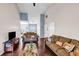 Living room featuring high vaulted ceilings, fireplace and plenty of natural light at 5806 Highgrove Dr, Atlanta, GA 30349