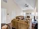 Living room featuring a fireplace and a ceiling fan at 5806 Highgrove Dr, Atlanta, GA 30349