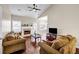 Spacious living room featuring a fireplace and plenty of natural light at 5806 Highgrove Dr, Atlanta, GA 30349