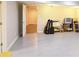 Basement area with large tile flooring, ample space, and recessed lighting at 1104 Fox Ln, Woodstock, GA 30188