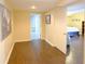 Hallway that connects to the rooms in the house with wood flooring at 1104 Fox Ln, Woodstock, GA 30188