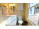 Cozy powder room featuring a new vanity with a mirror and sink at 1104 Fox Ln, Woodstock, GA 30188