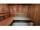 View of the sauna interior with wooden benches and a bucket at 1104 Fox Ln, Woodstock, GA 30188