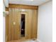 Sauna room with wooden paneling and glass door at 1104 Fox Ln, Woodstock, GA 30188