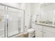 Bathroom boasts shower stall and modern vanity with granite countertop for clean and efficient use at 2015 Wyndham Pl, Conyers, GA 30013