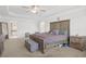 Spacious main bedroom with a ceiling fan at 693 Python Dr, Atlanta, GA 30349