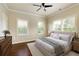 Bedroom showcasing neutral walls, hardwood floors, and ample sunlight at 1365 Hawthorne Se Ave, Smyrna, GA 30080