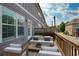 Cozy outdoor deck has seating and a small table; ideal for relaxing outside at 1365 Hawthorne Se Ave, Smyrna, GA 30080