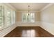 Bright dining room with large windows, plantation shutters and wood floors at 1365 Hawthorne Se Ave, Smyrna, GA 30080