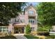 Beautiful two-story brick home with manicured lawn, charming shutters, and a welcoming front entrance at 1365 Hawthorne Se Ave, Smyrna, GA 30080