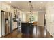 Stylish kitchen featuring stainless steel appliances, a large island, and modern pendant lighting at 1365 Hawthorne Se Ave, Smyrna, GA 30080