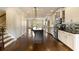 Open kitchen featuring stainless steel appliances, an island with bar seating, and hardwood floors at 1365 Hawthorne Se Ave, Smyrna, GA 30080