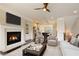Comfortable living room with fireplace and seamless flow to the modern kitchen at 1365 Hawthorne Se Ave, Smyrna, GA 30080