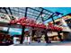 Exterior view of the Atlanta Braves entrance with fountains and pedestrian seating areas at 1365 Hawthorne Se Ave, Smyrna, GA 30080