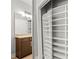 View of the bathroom and an adjacent walk-in closet with ample storage space at 2865 Lenox Ne Rd # 410, Atlanta, GA 30324