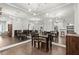 Elegant dining room featuring large mirror and chandelier lighting at 2865 Lenox Ne Rd # 410, Atlanta, GA 30324