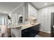 Stylish kitchen features granite countertops, shaker cabinets, and stainless steel appliances at 2865 Lenox Ne Rd # 410, Atlanta, GA 30324