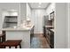 Efficient kitchen featuring stainless steel appliances and breakfast bar at 2865 Lenox Ne Rd # 410, Atlanta, GA 30324