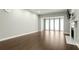 Open living room with lots of natural light, hardwood floors, and fireplace at 2865 Lenox Ne Rd # 410, Atlanta, GA 30324
