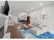Inviting living room with a fireplace, modern furnishings, and hardwood floors at 2865 Lenox Ne Rd # 410, Atlanta, GA 30324