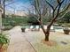 Outdoor pool area with lounge chairs, greenery, and peaceful atmosphere at 2865 Lenox Ne Rd # 410, Atlanta, GA 30324