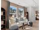Inviting sitting area with comfortable couch, ample lighting, and scenic views, perfect for unwinding and relaxation at 309 Heavenly Hollow Pl, Mcdonough, GA 30253