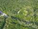 Overhead view of a wooded property, highlighting its privacy and natural setting at 4422 Fincher Rd, Canton, GA 30114