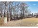 Large backyard with a fence and mature trees, perfect for outdoor activities at 974 Shirley Se St, Smyrna, GA 30082