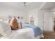 Cozy main bedroom with a king-size bed, soft textiles, and an en-suite bathroom at 390 17Th Nw St # 3055, Atlanta, GA 30363