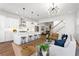 Bright open living space with modern lighting, hardwood floors, and a spacious open floor plan to the kitchen at 971 Boulevard Se # A, Atlanta, GA 30312