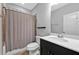 Bathroom with tile floor, white vanity sink, neutral color scheme, and shower with curtain at 2090 Callaway Nw Ct, Atlanta, GA 30318