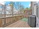 Wooden deck with railing and outdoor grill; great for entertaining and relaxing at 2090 Callaway Nw Ct, Atlanta, GA 30318