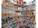 Walk-in pantry with shelving stocked with food items, storage containers, and home goods at 2090 Callaway Nw Ct, Atlanta, GA 30318