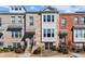 Charming townhouse with a brick facade and a well-manicured front yard at 2569 Village Park Bnd, Duluth, GA 30096